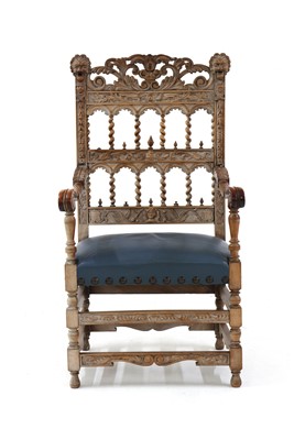 Lot 417 - A 19th century limed oak throne chair