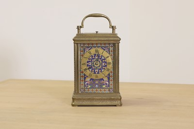 Lot 227 - A French brass and enamel cased carriage clock