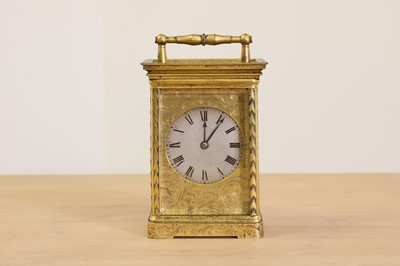 Lot 225 - An English brass cased carriage clock
