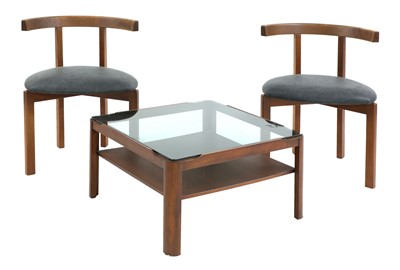 Lot 696 - A pair of afrormosia 'T' chairs