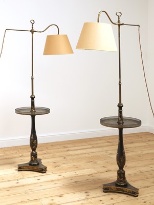 Lot 84 - A pair of black-lacquered reading lamp standards