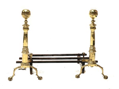 Lot 337 - A pair of brass fire dogs