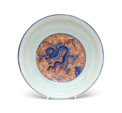 Lot 259 - A Chinese blue and white and iron red plate