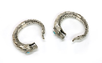 Lot 256 - A pair of matching sterling silver torque bangles