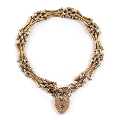 Lot 1112 - A 9ct gold gate bracelet
