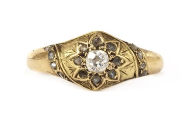 Lot 1033 - A Victorian gold diamond star cluster ring