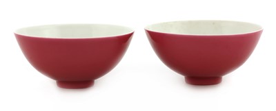Lot 64 - A pair of Chinese ruby-enamelled tea bowls