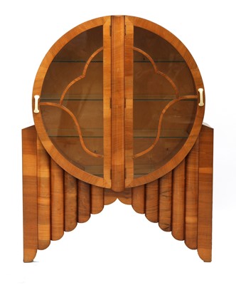Lot 183 - An Art Deco walnut ‘Rocket’ display cabinet