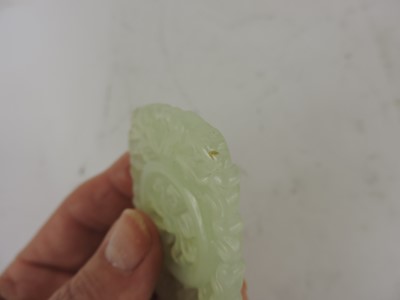 Lot 116 - Two Chinese pierced and carved jade plaques