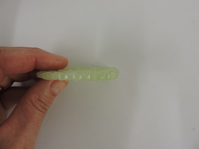 Lot 116 - Two Chinese pierced and carved jade plaques