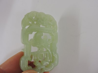 Lot 116 - Two Chinese pierced and carved jade plaques