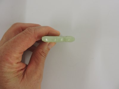 Lot 116 - Two Chinese pierced and carved jade plaques