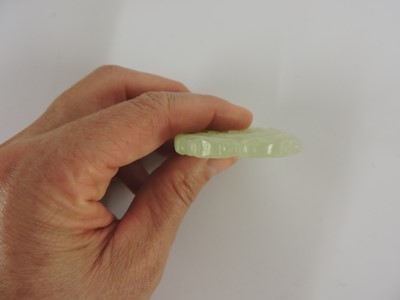 Lot 116 - Two Chinese pierced and carved jade plaques