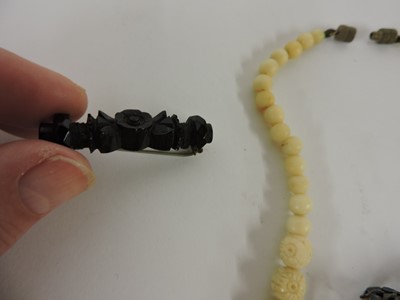 Lot 116 - Two Chinese pierced and carved jade plaques