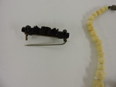 Lot 116 - Two Chinese pierced and carved jade plaques