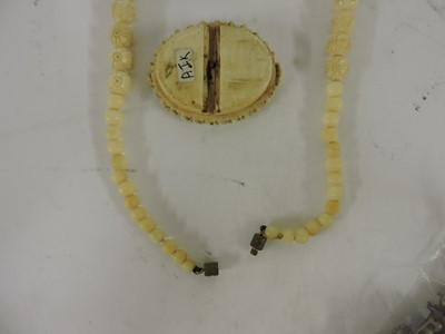 Lot 116 - Two Chinese pierced and carved jade plaques