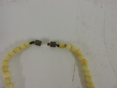 Lot 116 - Two Chinese pierced and carved jade plaques