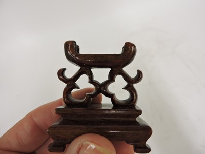 Lot 116 - Two Chinese pierced and carved jade plaques