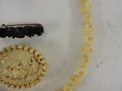 Lot 116 - Two Chinese pierced and carved jade plaques