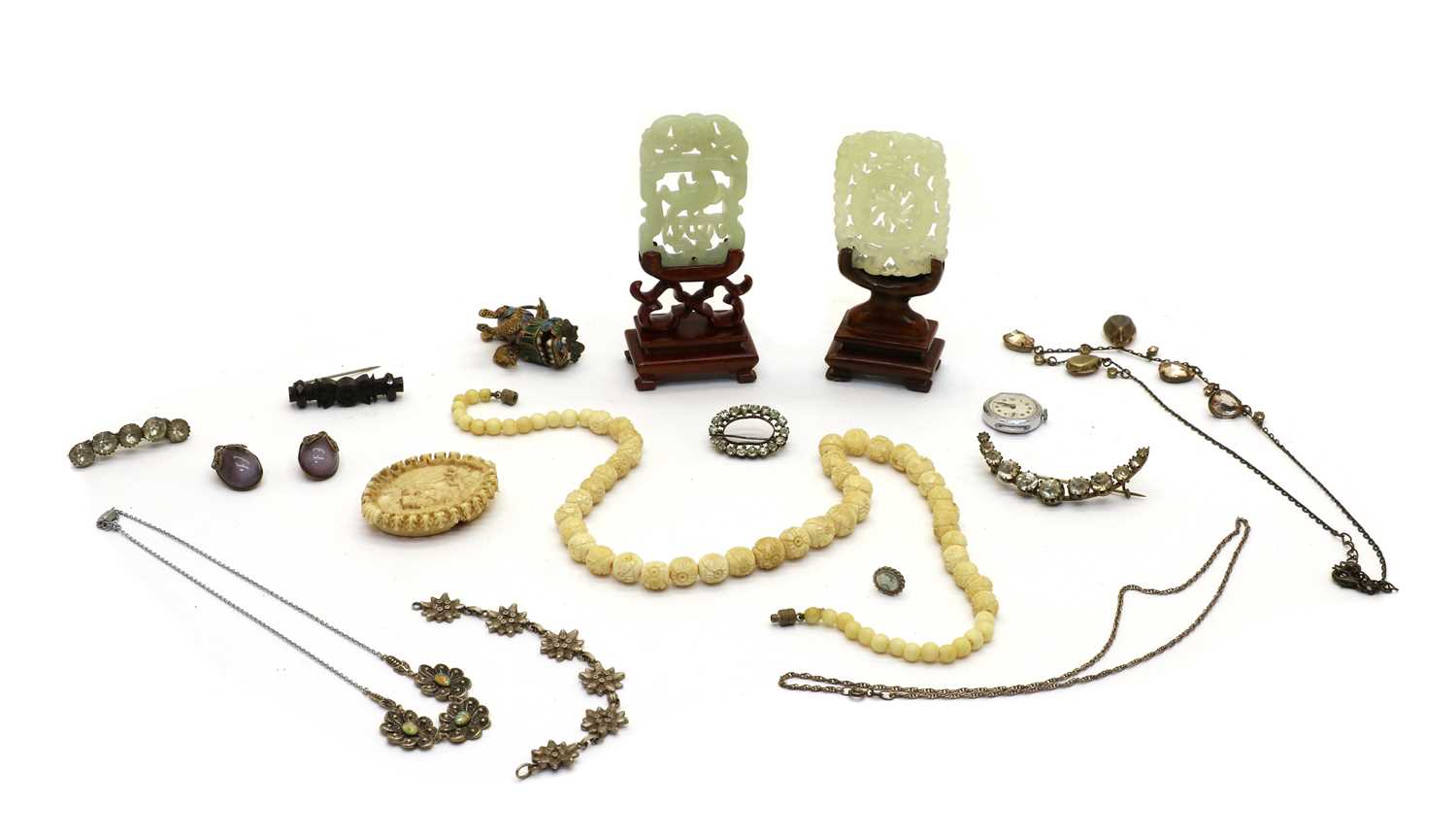 Lot 116 - Two Chinese pierced and carved jade plaques