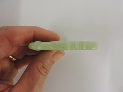 Lot 116 - Two Chinese pierced and carved jade plaques