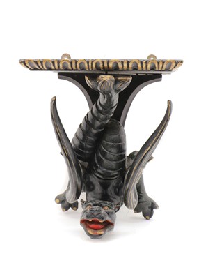 Lot 154 - A carved and painted wooden wall bracket