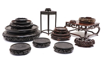 Lot 126 - A collection of Chinese hardwood stands