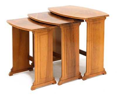 Lot 175 - An Art Deco walnut nest of three tables