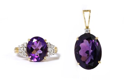 Lot 135 - A 14ct gold amethyst and diamond pendant