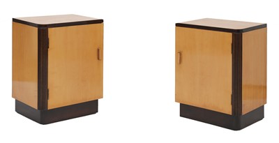 Lot 232 - A pair of Art Deco maple bedside cupboards