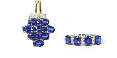 Lot 123 - A 9ct gold kyanite and diamond pendant