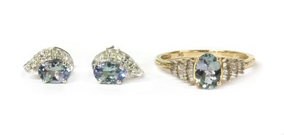 Lot 121 - A 9ct gold gem set and diamond ring