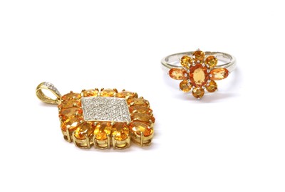 Lot 138 - A 9ct white gold yellow sapphire cluster ring