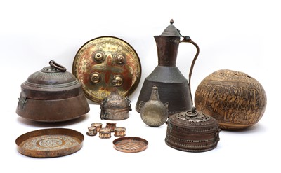 Lot 235 - A collection of Eastern brass and copper wares