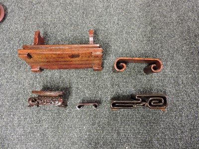 Lot 162 - A collection of Chinese wood stands
