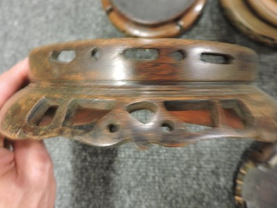 Lot 162 - A collection of Chinese wood stands