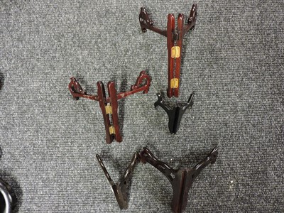 Lot 162 - A collection of Chinese wood stands