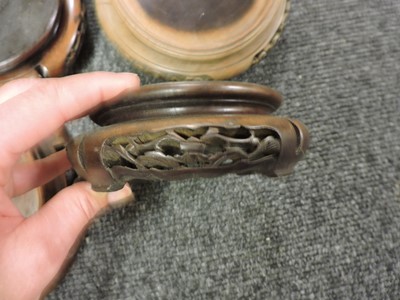 Lot 162 - A collection of Chinese wood stands