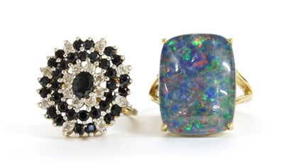 Lot 164 - A 9ct gold sapphire and diamond cluster ring