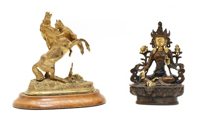 Lot 215 - A gilt-bronze figural group
