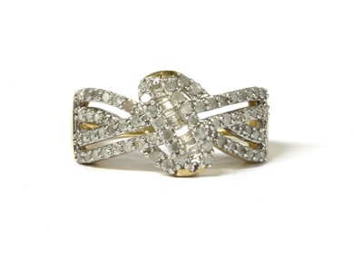 Lot 134 - A 9ct gold diamond set knot design ring