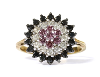 Lot 130 - A 9ct gold treated diamond cluster ring