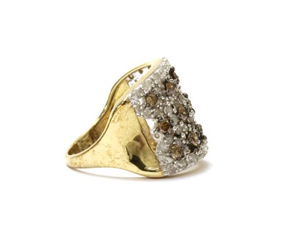 Lot 70 - A 9ct gold diamond and  brown diamond ring