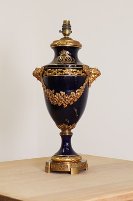 Lot 243 - A cobalt blue porcelain and gilt-bronze table lamp