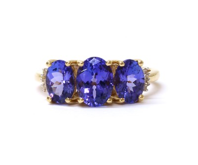 Lot 188 - An 18ct gold tanzanite and diamond ring