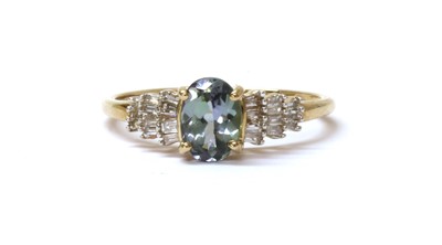 Lot 184 - A 9ct gold zoisite and diamond ring