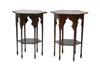 Lot 422 - A near pair of Liberty style Moorish oak side tables