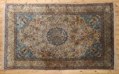 Lot 248 - A Persian silk carpet