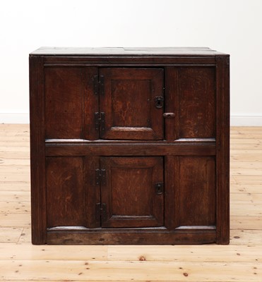 Lot 402 - An oak cupboard