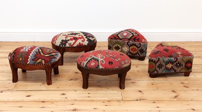 Lot 266 - A collection of kilim-upholstered footstools